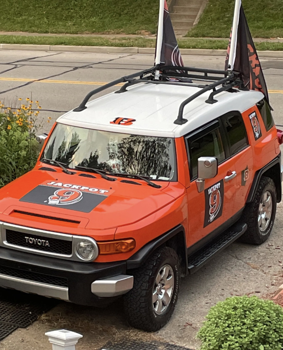 Meyer packs his bright-orange Toyota FJ Cruiser the night before the game, so he can arrive to the Bengals tailgating lot in the early morning hours.